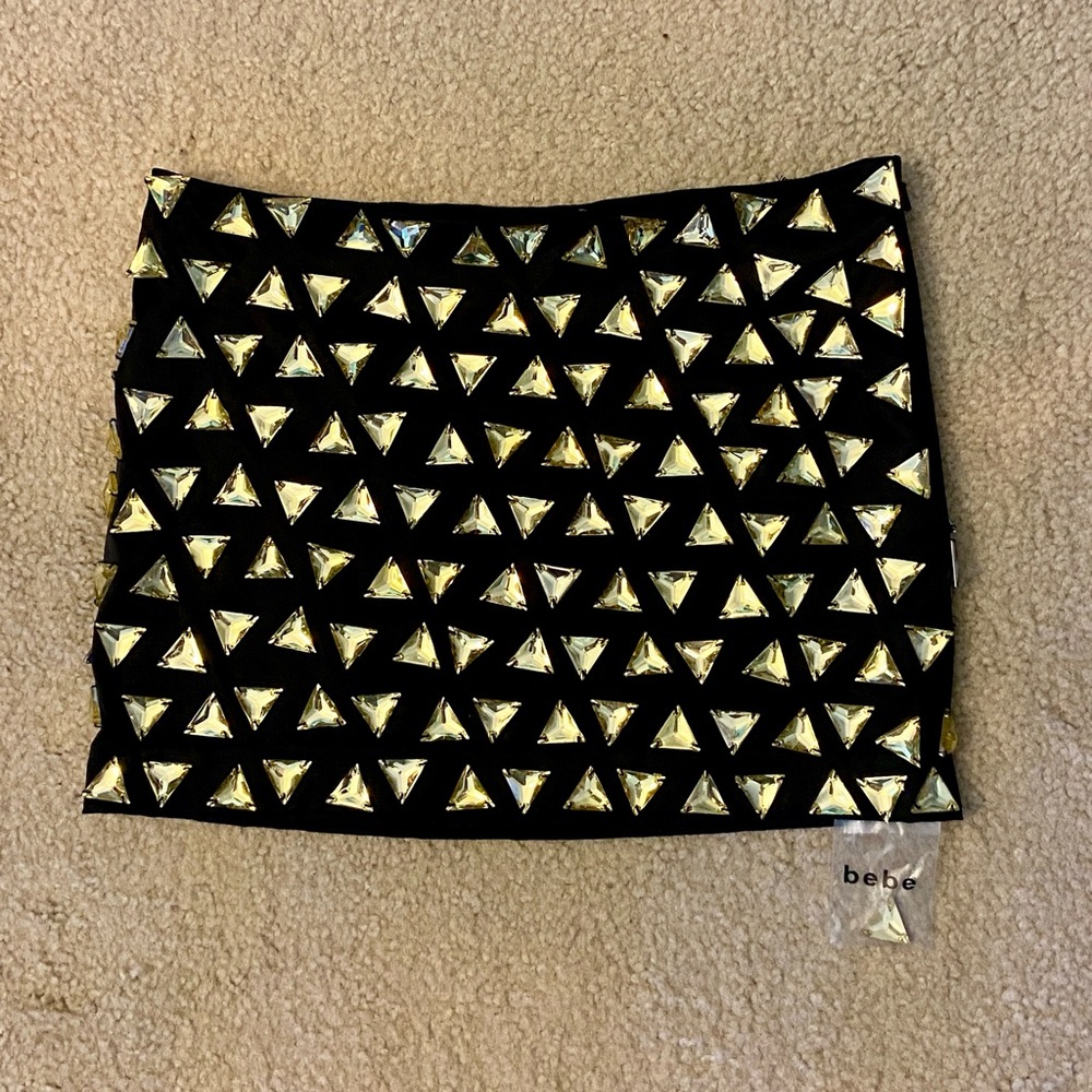 Bebe Black Mini Skirt with Gold Triangle Accents
